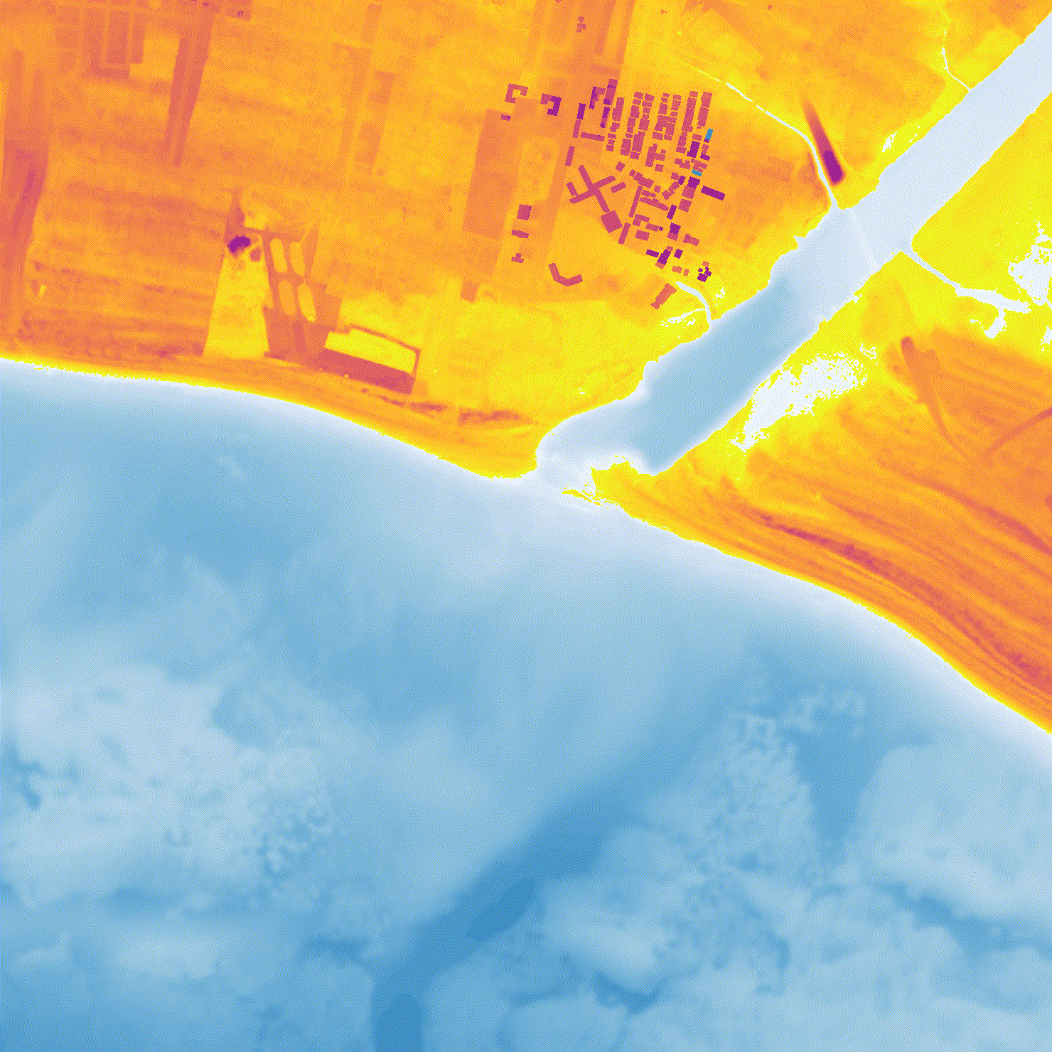 Near-real-time CelerisAi depth-averaged wave simulation over Loiza, Puerto Rico; incoming tsunami-like wave interacts with coastline and a nearby river inlet; school site and probe locations marked.